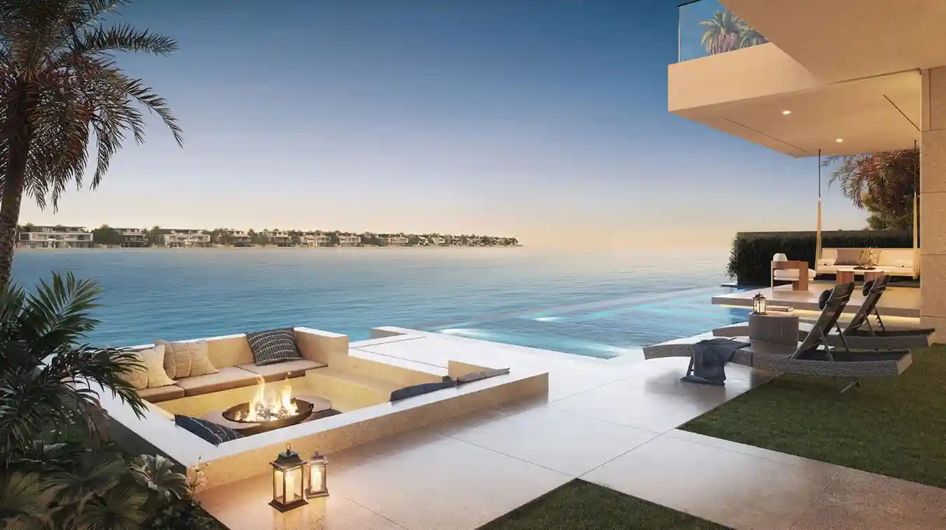 Villa terrace with a sunken seating area and a sea view at sunset