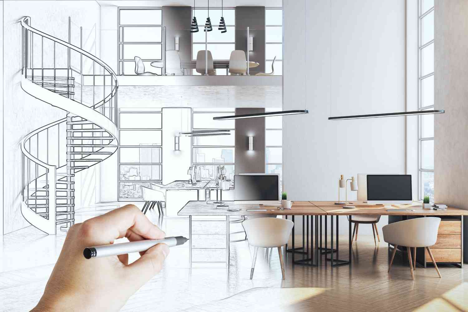 A hand sketching an office interior that blends into the finished room