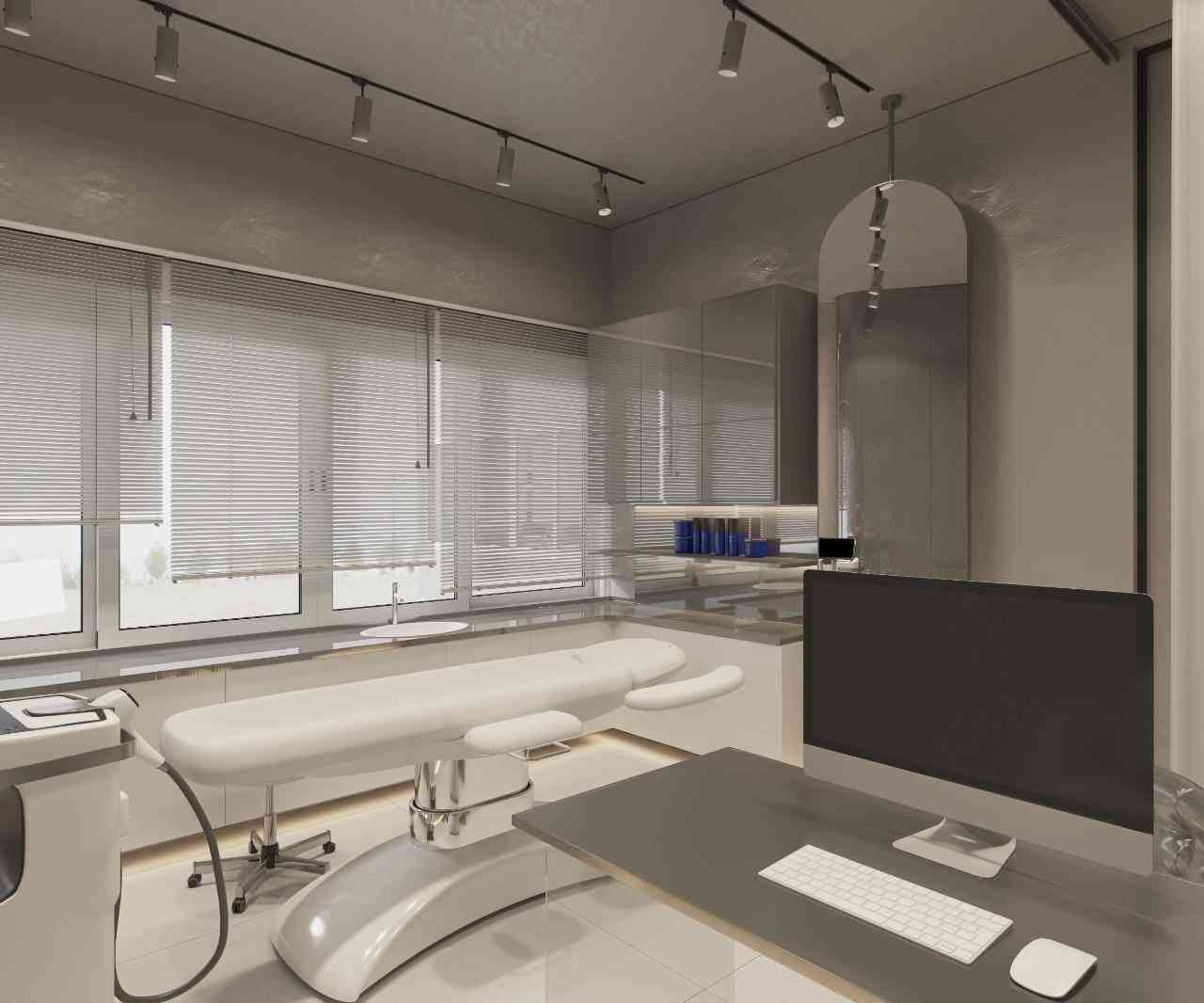 Clinic treatment room with a treatment chair and a monitor