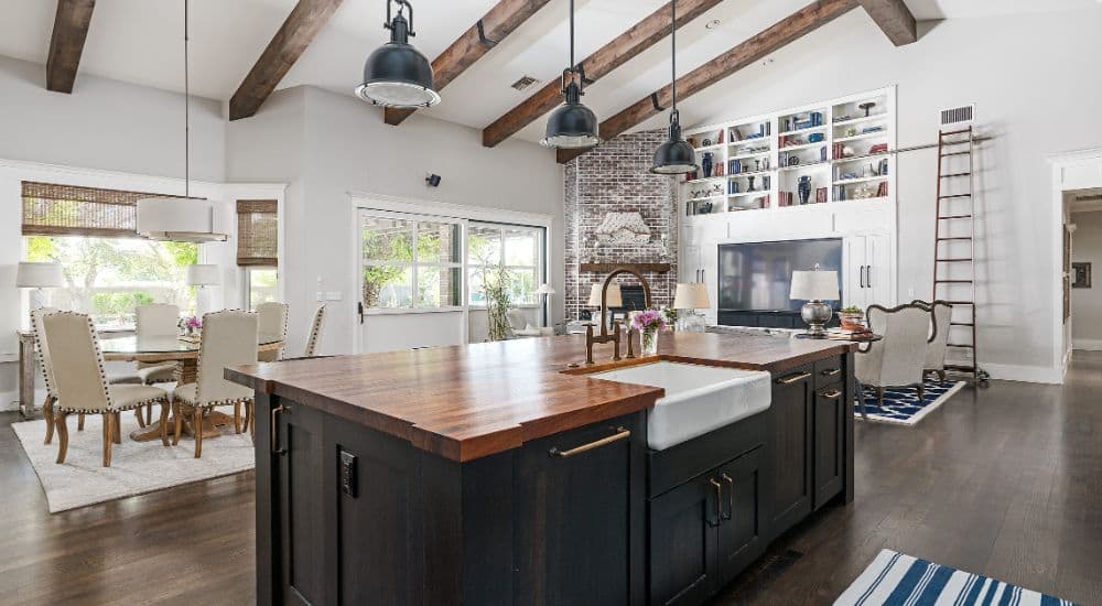 Kitchen with a timber island and pendant lights